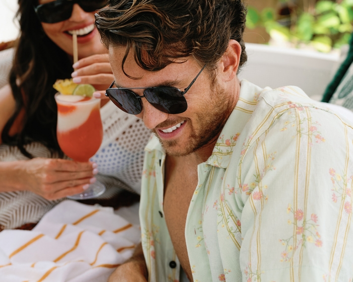 two people laughing outside