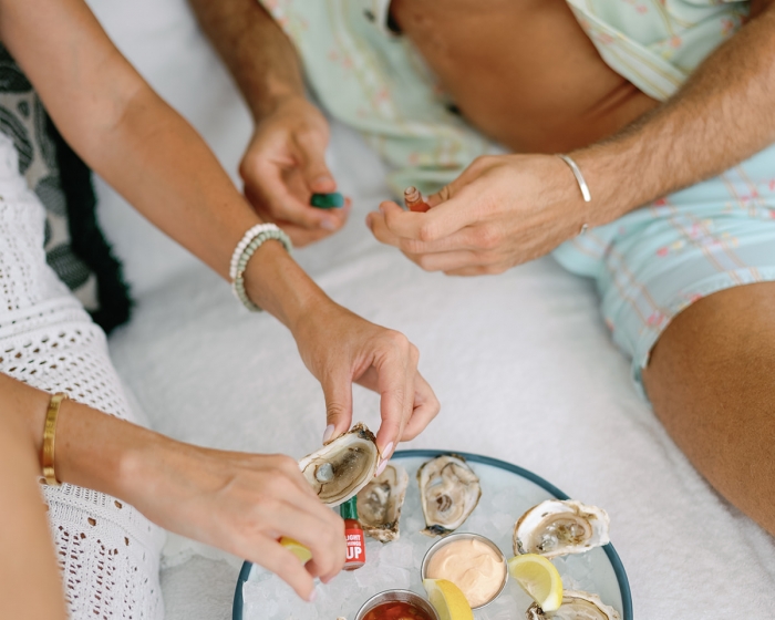 people enjoying oysters