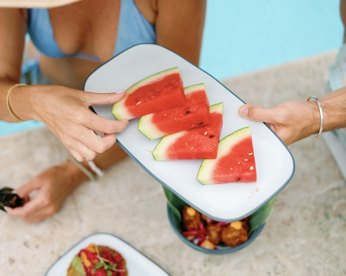 a plate of watermelons outdoors