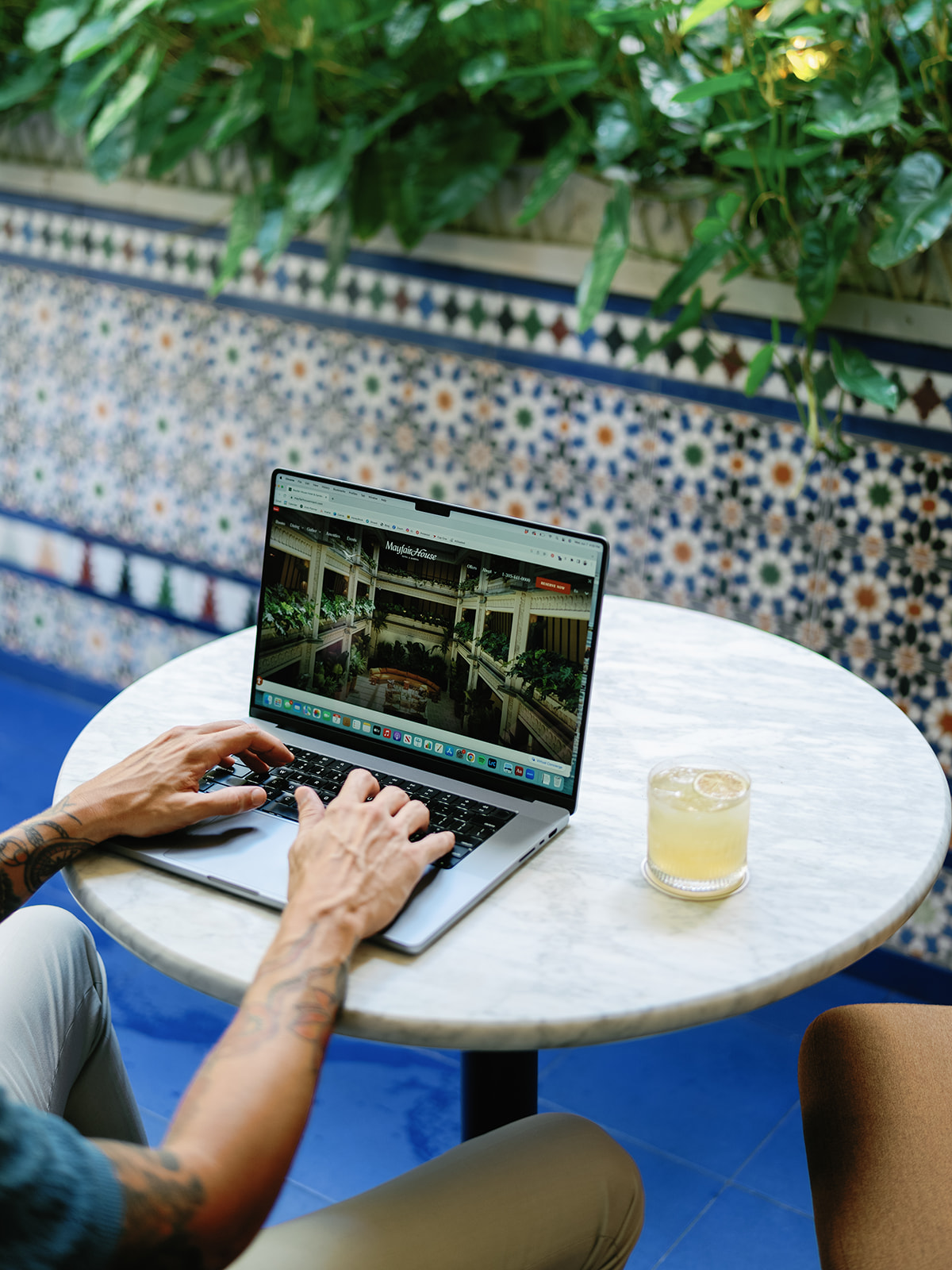 someone looking at the mayfair house website