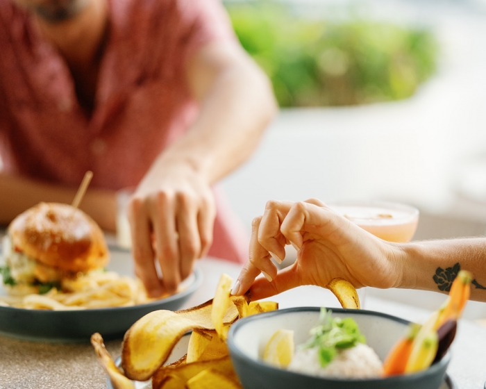 people eating food out doors