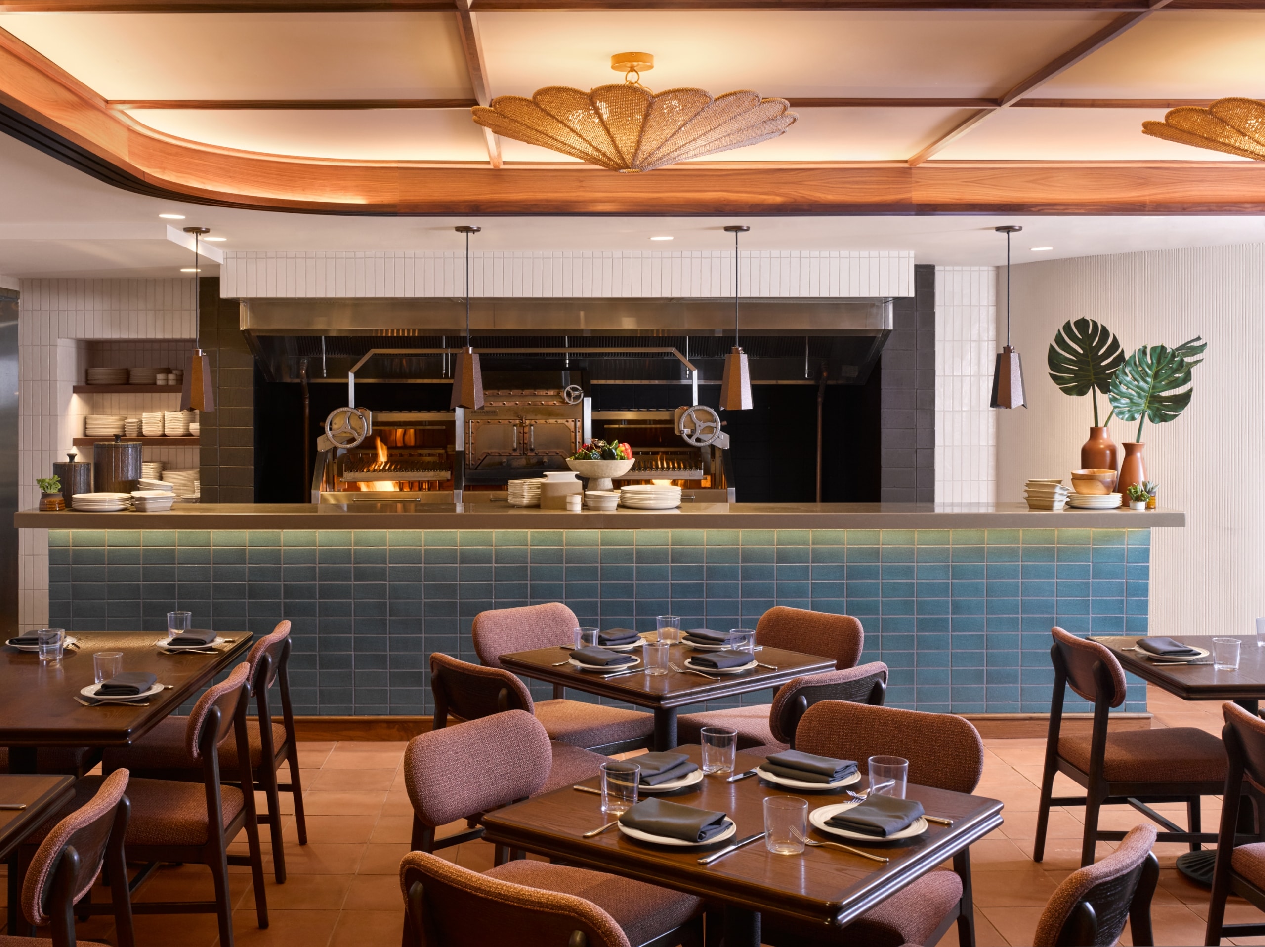 a restaurant dining area with tables and chairs