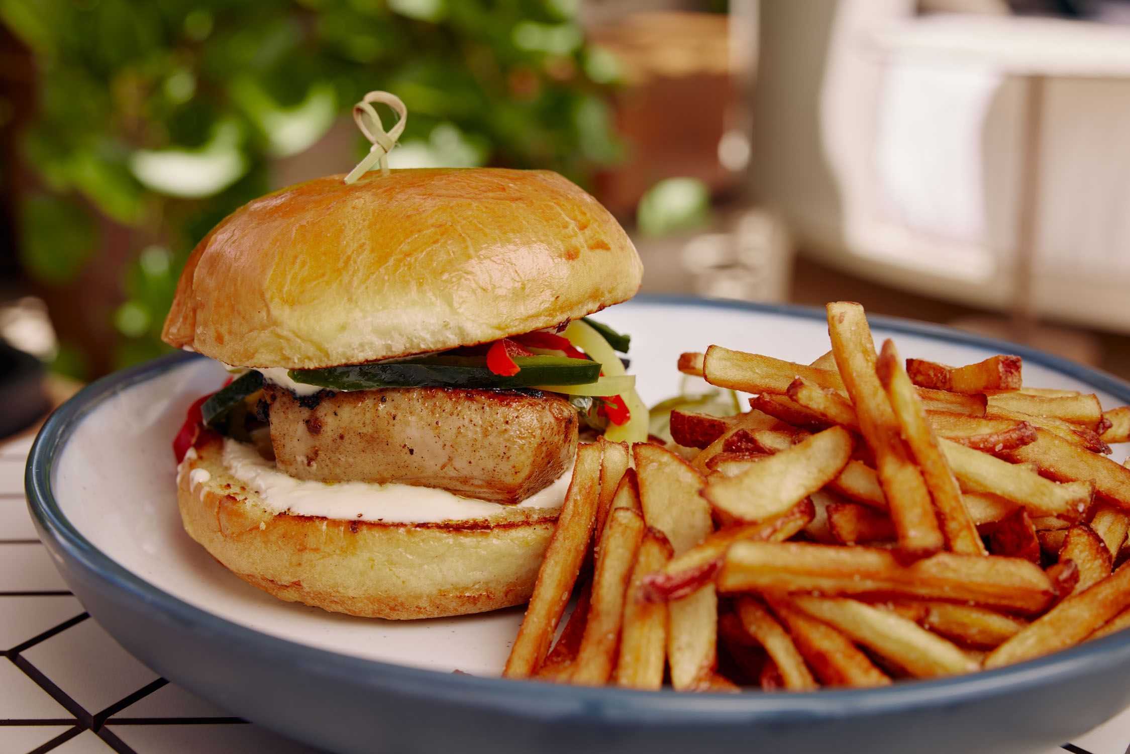 A burger and fries on a plate