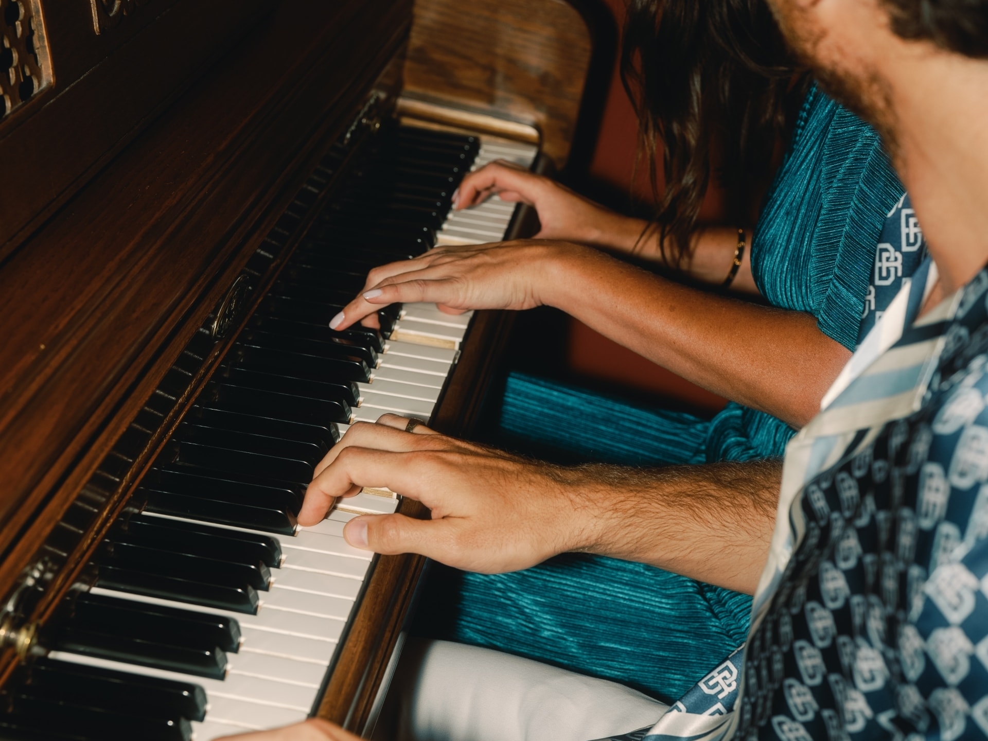 people playing the piano