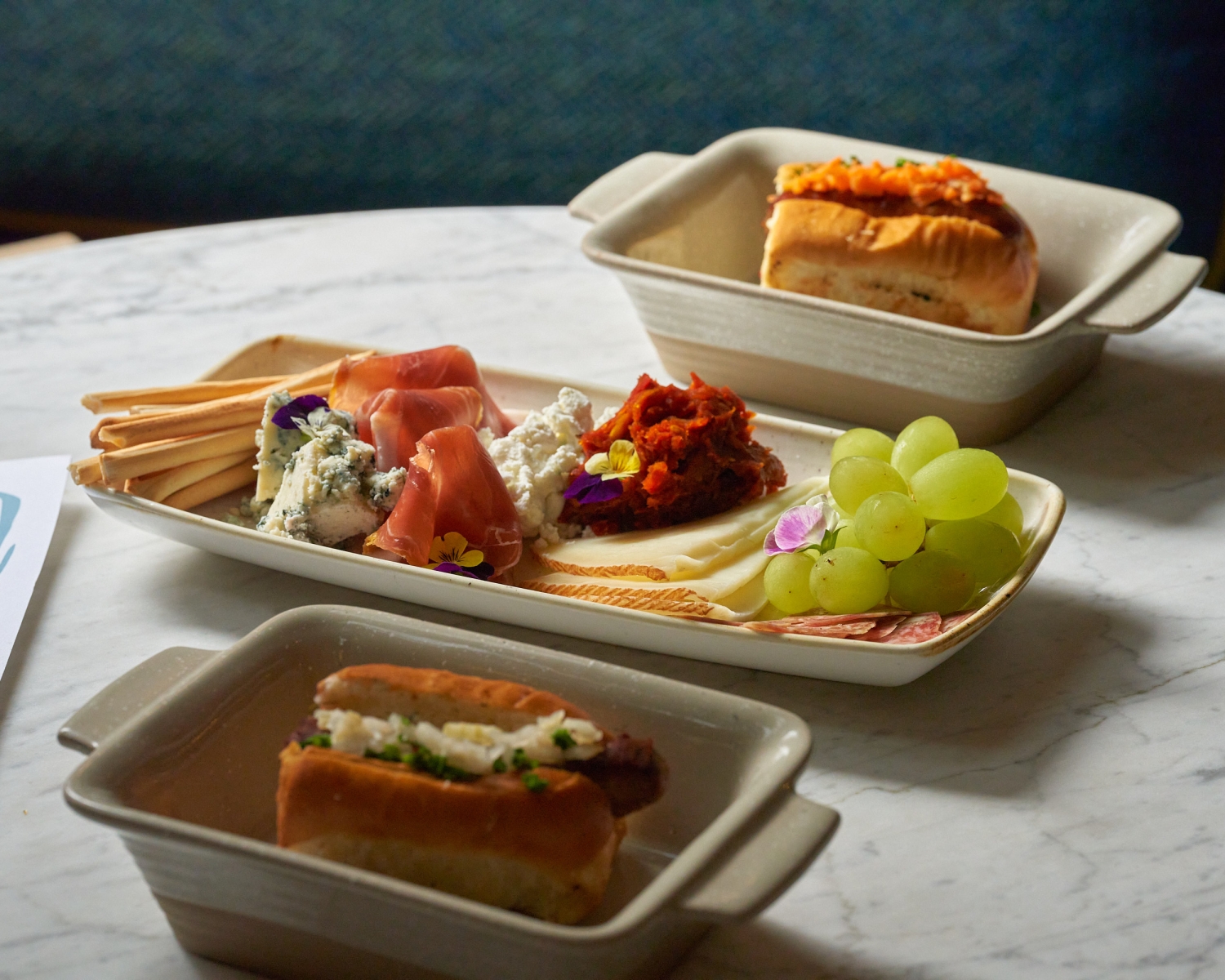 Plates of food sitting on a table