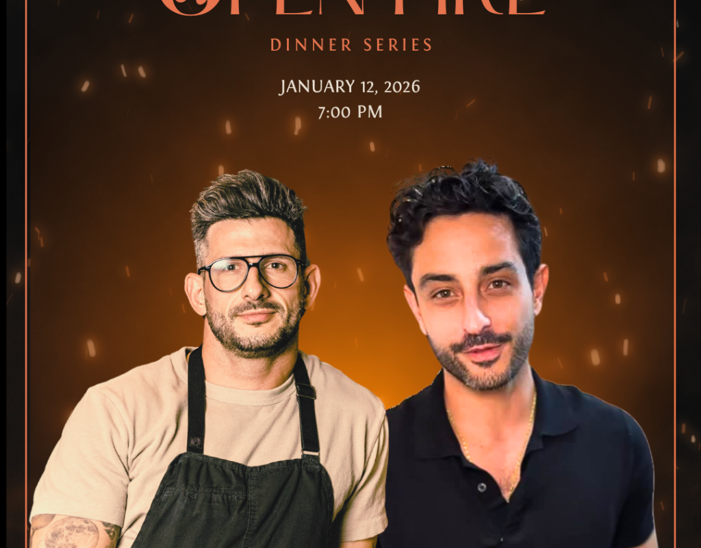 Two chefs stand next to one another